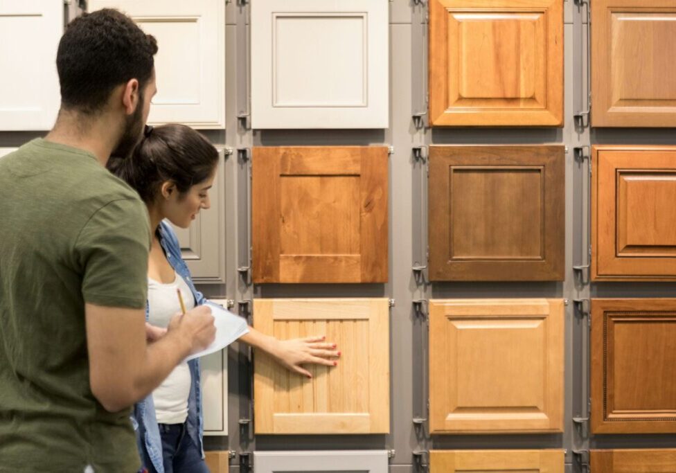 couple choosing the right kitchen cabinets for them